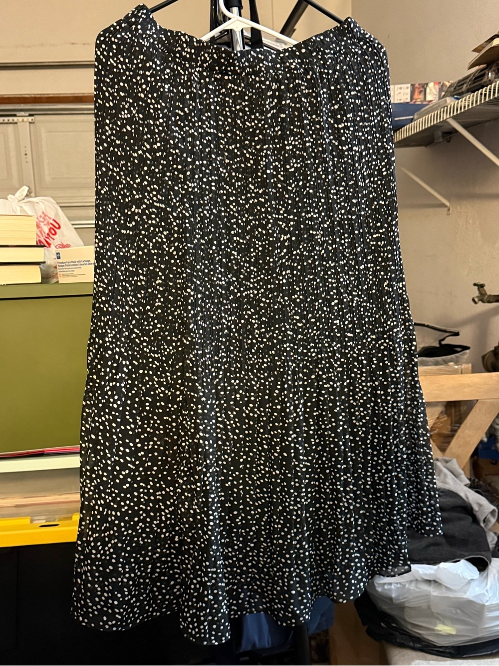 Flowy midi skirt with a playful polka dot pattern. Lightweight fabric that moves